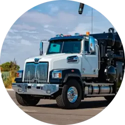White hydrovac truck with black decals