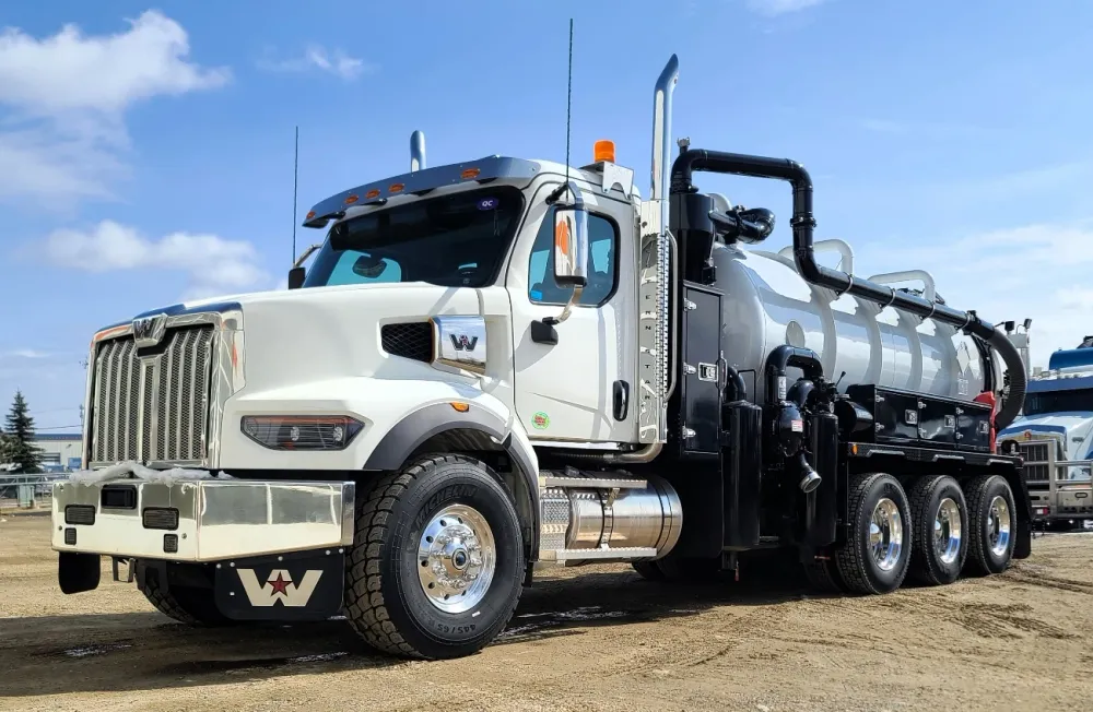 A white vacuum truck